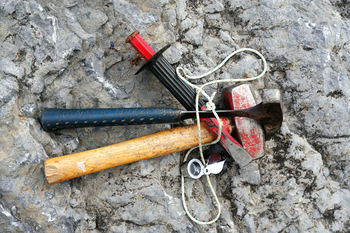 Geologic field work is usually done with fairly basic equipment. Hammer and chisel are still the most important tools today, and are used like geologists have done for centuries. A magnifier is used when searching for small fossils.